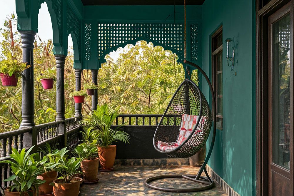 Black colour combination for peacock green theme for a balcony