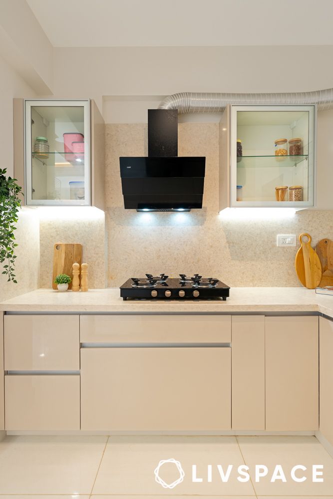 Beige kitchen design in a 3bhk in flat in bangalore