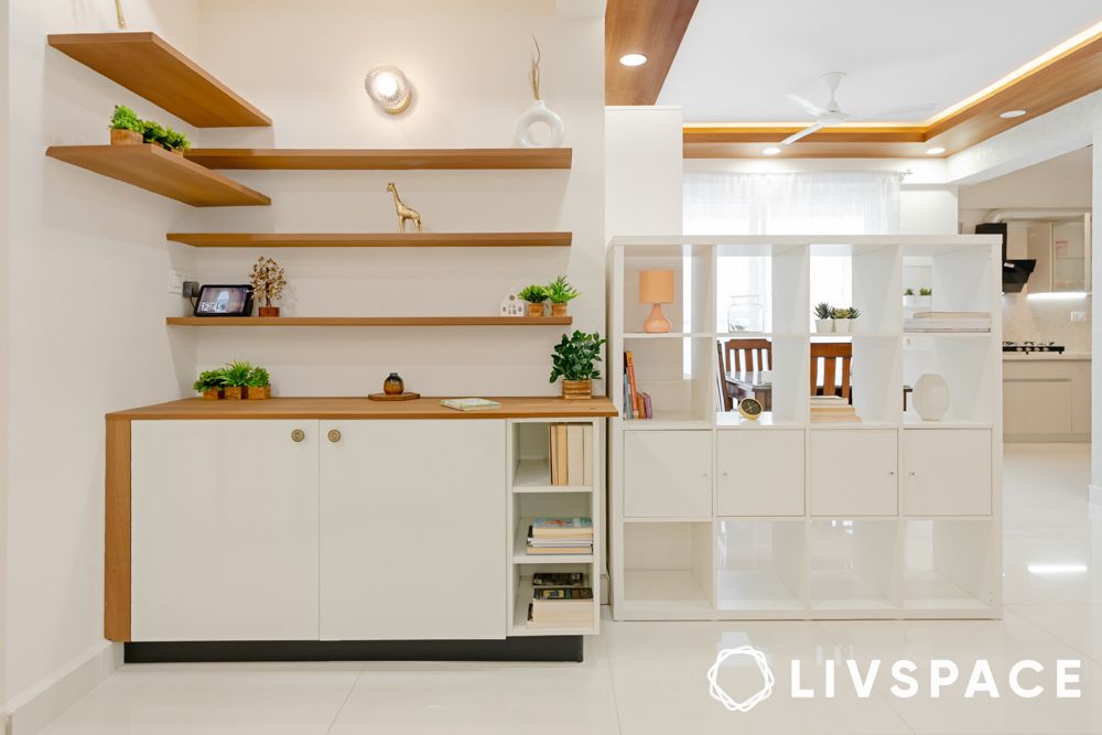 Open display unit as partition wall in an open concept living cum dining room