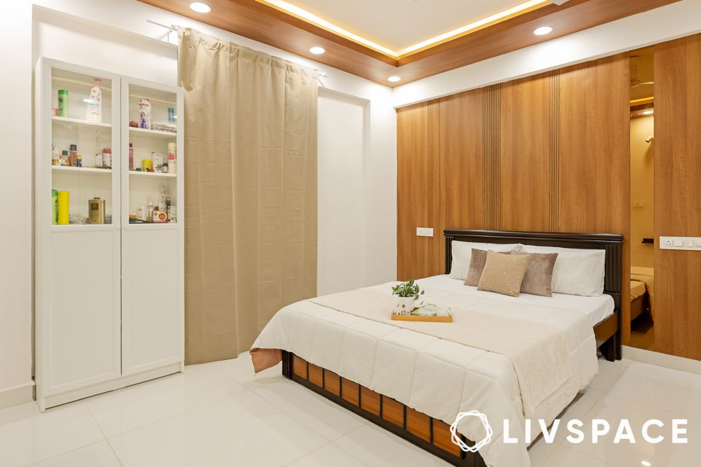 Master bedroom design with beige and wood tones