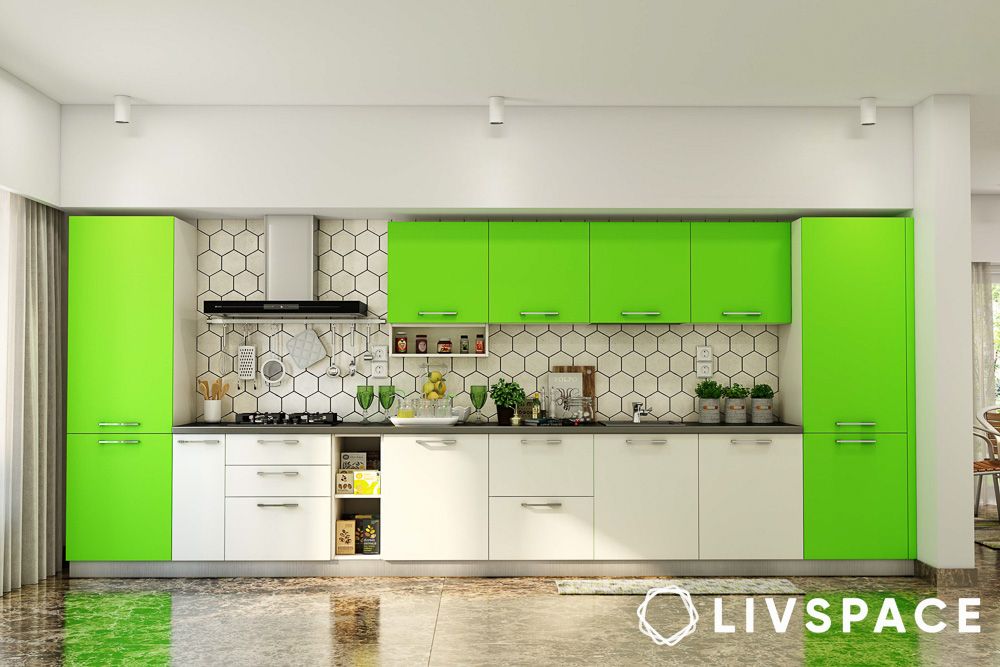 Open kitchen designs on a single wall with green and white laminate cabinets