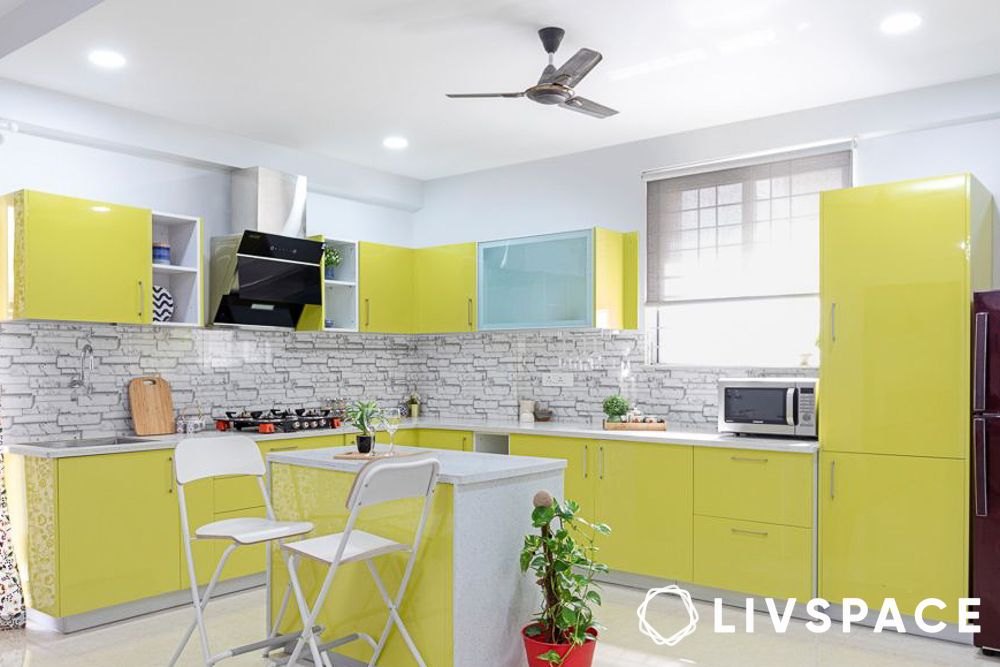 Yellow kitchen with an island