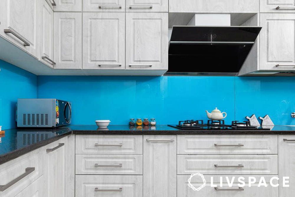 Rustic finish white kitchen with a blue backsplash