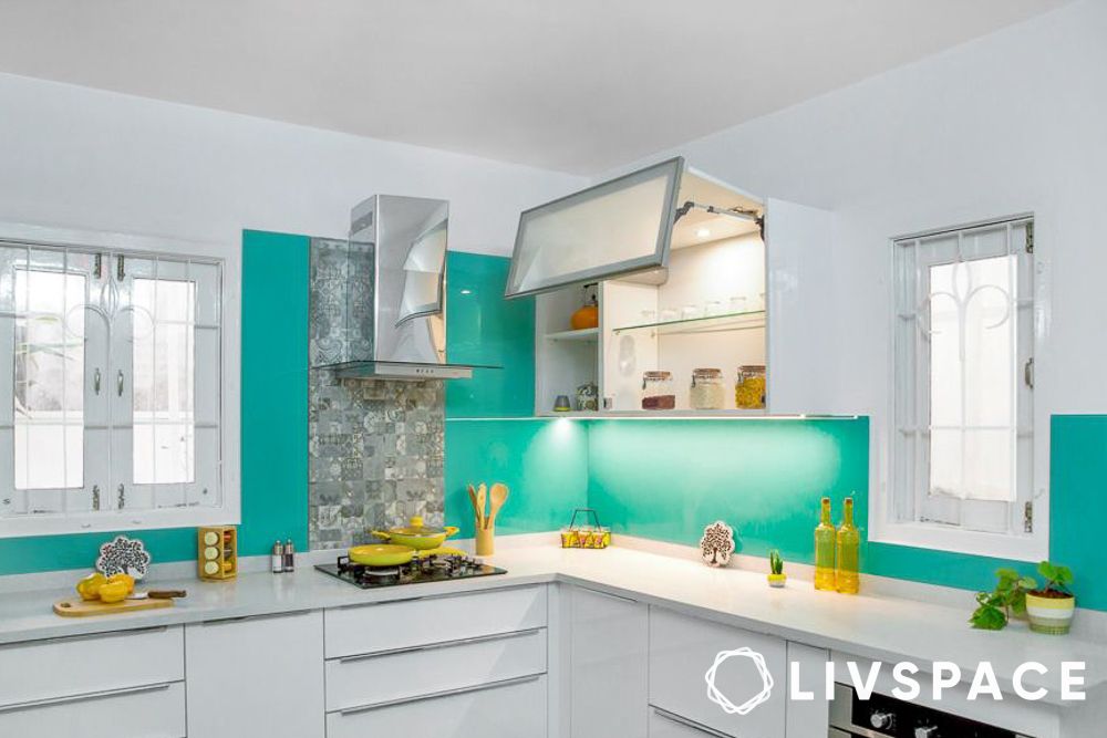 White kitchen with different cabinet mechanisms