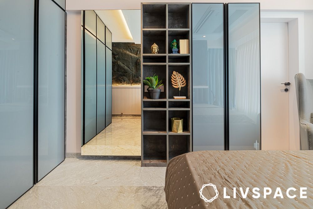 Open display case in the powder blue glossy wardrobe design