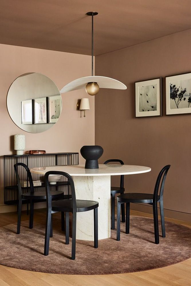 modern dining room with black metal chairs