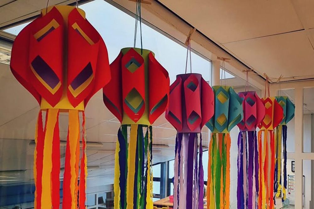 Holi decor ideas with paper lantern clusters