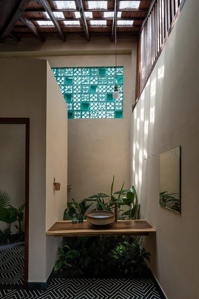 glass tiles on a terracotta tile ceiling