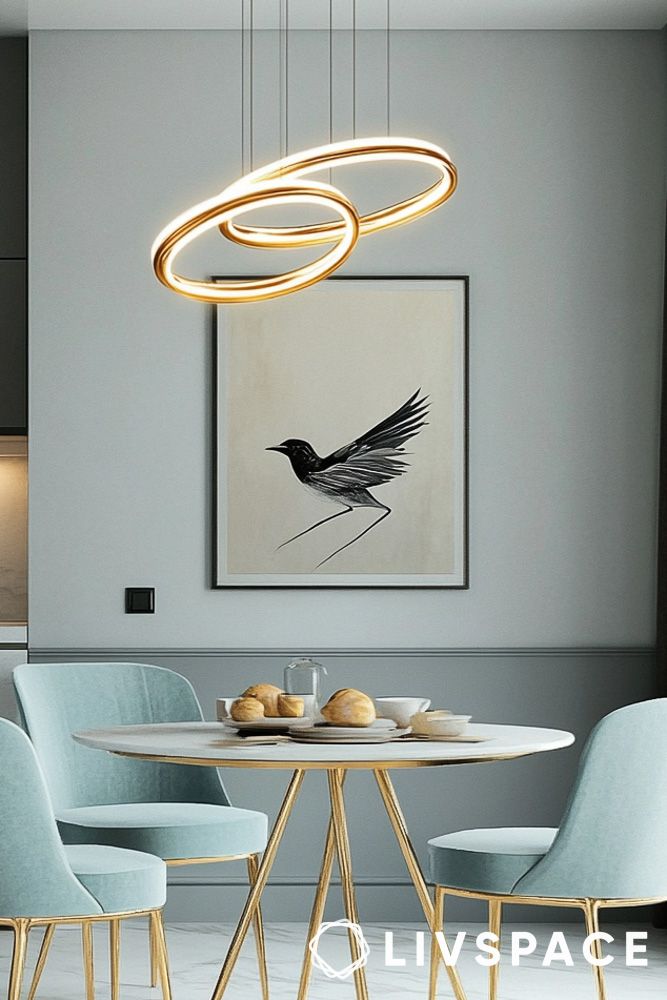 Eclectic pendant light in a small dining room