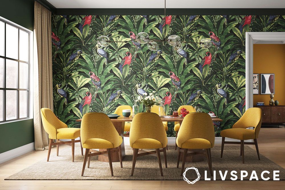 green and pink tropical wallpaper in a dining room