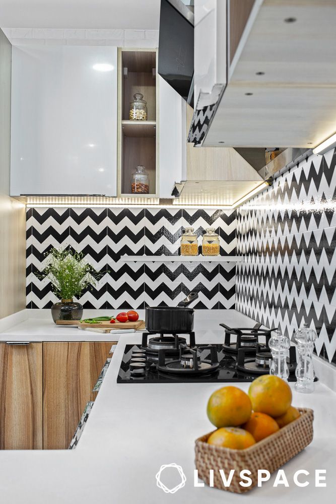 aztec pattern kitchen backsplash in a white kitchen