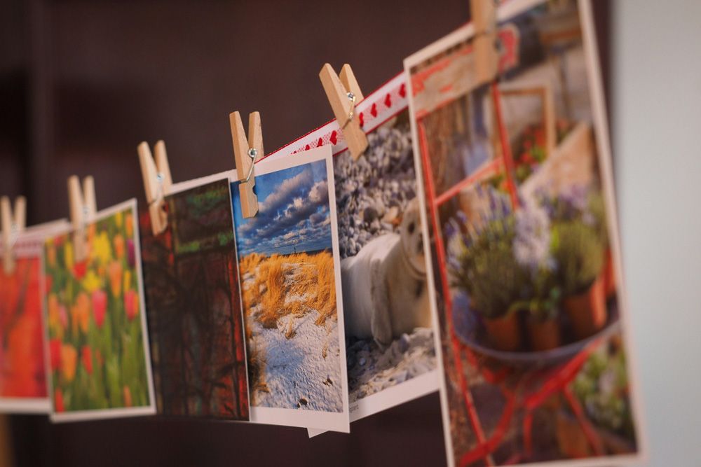 postcards hung as travel room decor