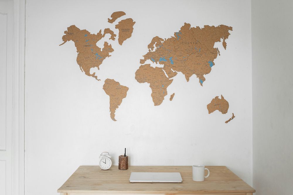maps being used as room decor on a wall