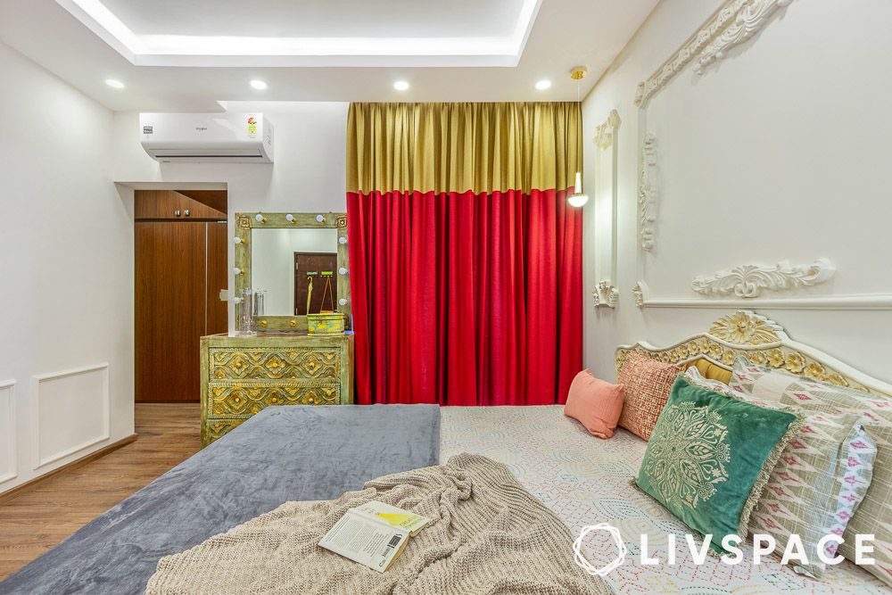 yellow and red curtains in bedroom