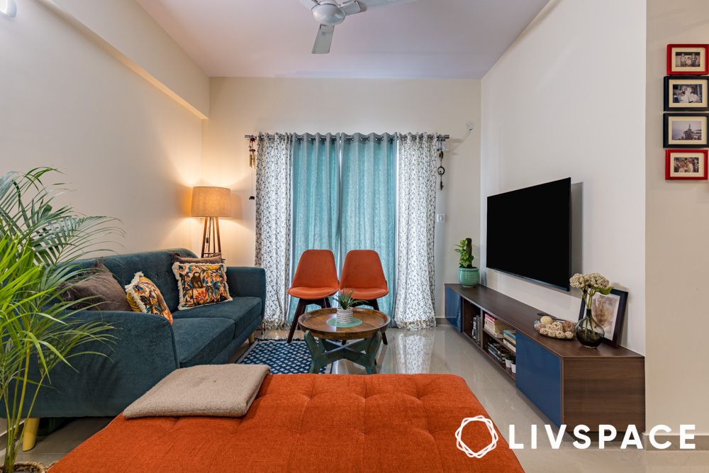 cosy living room with colourful sofas