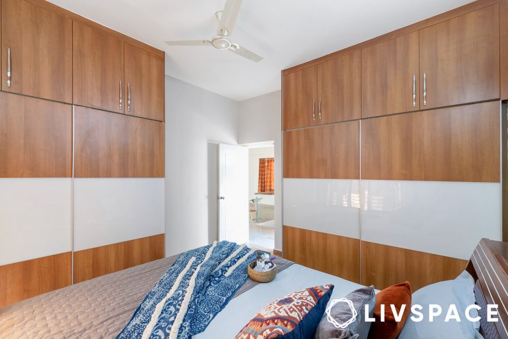 wooden wardrobe design in bedroom