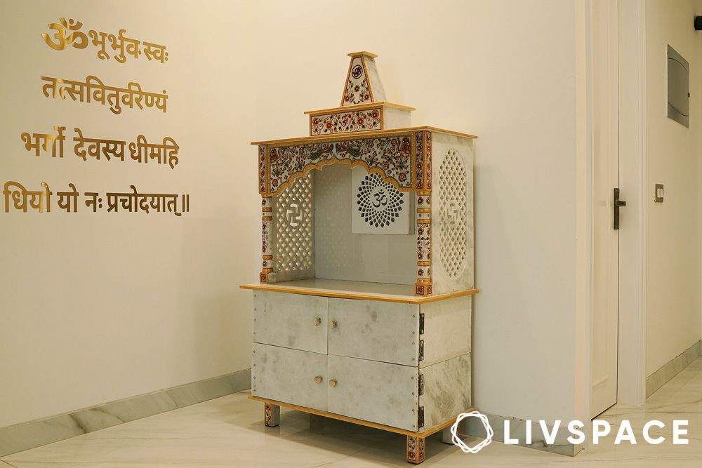 Indian traditional marble pooja room design with wooden canopy