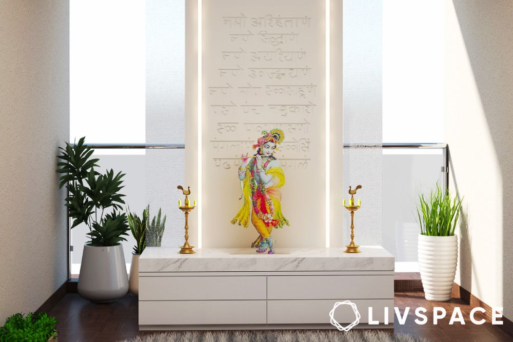 modern floor mounted pooja unit design with Sanskrit inscriptions