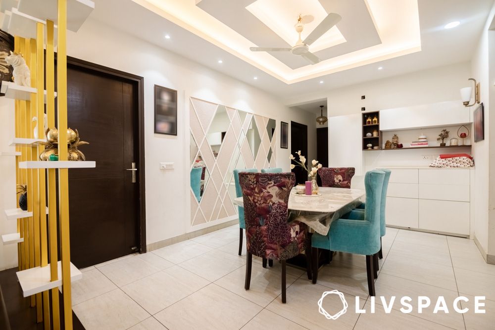 dining room with crockery cabinet by interior designer in noida