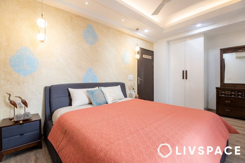 master bedroom with accent wall home interior design in Noida