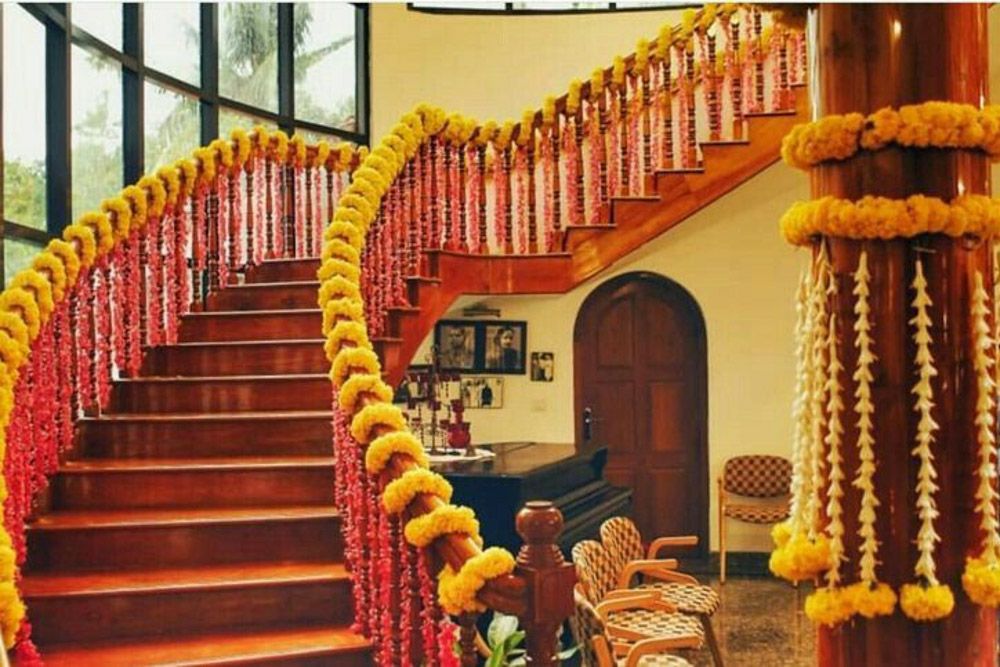 diwali decoration tips 2025 marigold garlands on staircase