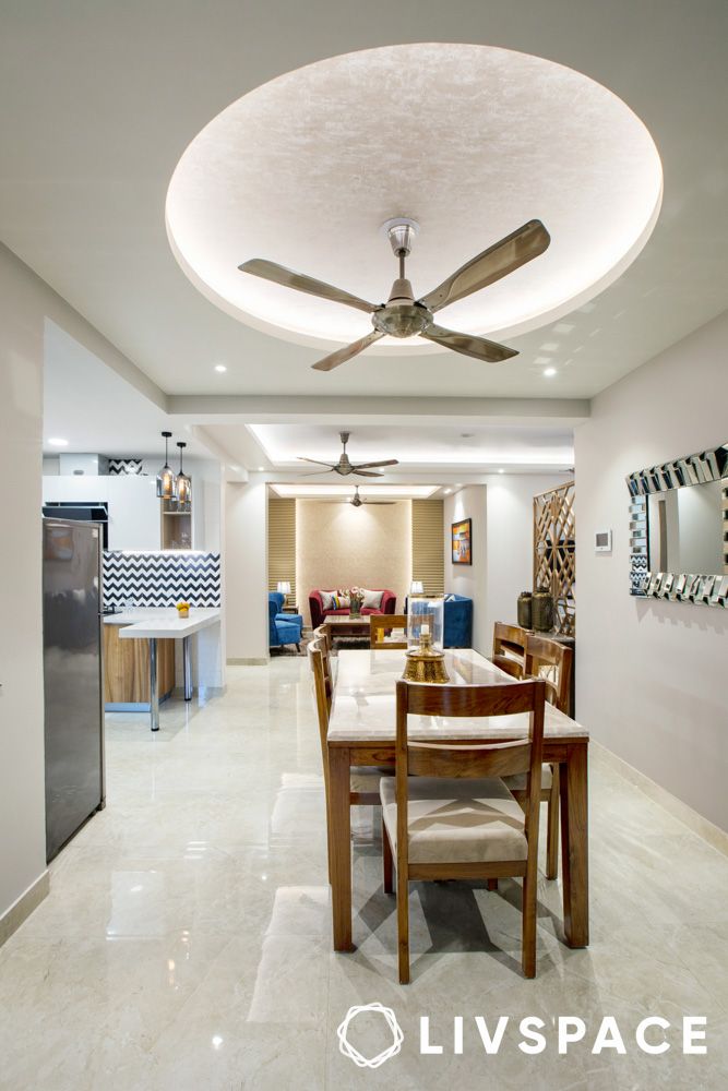 curved gypsum false ceiling in living and dining room