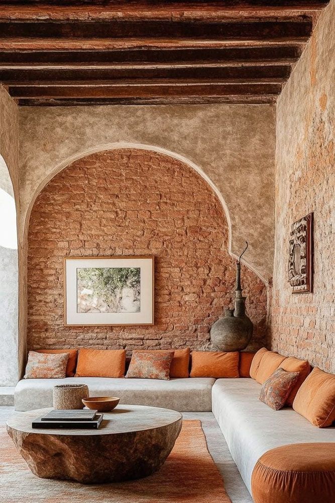 Terracotta accent wall with limewash finish in living room