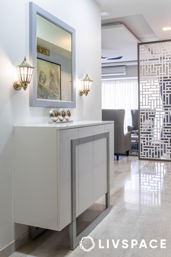 Modern console tables in hallway interior