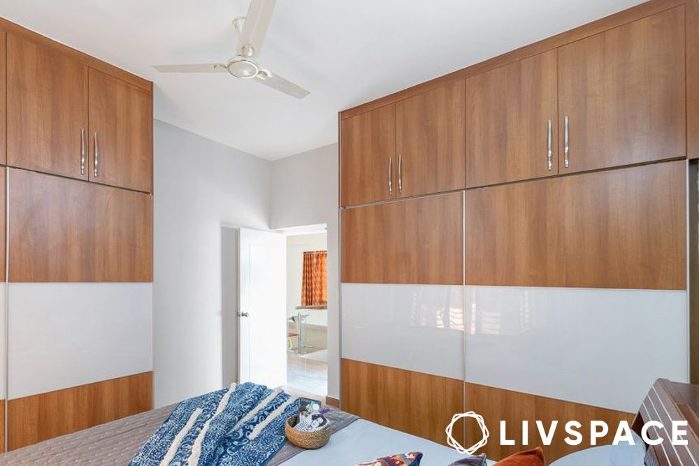 sliding wardrobe in bedroom design in compact spaces