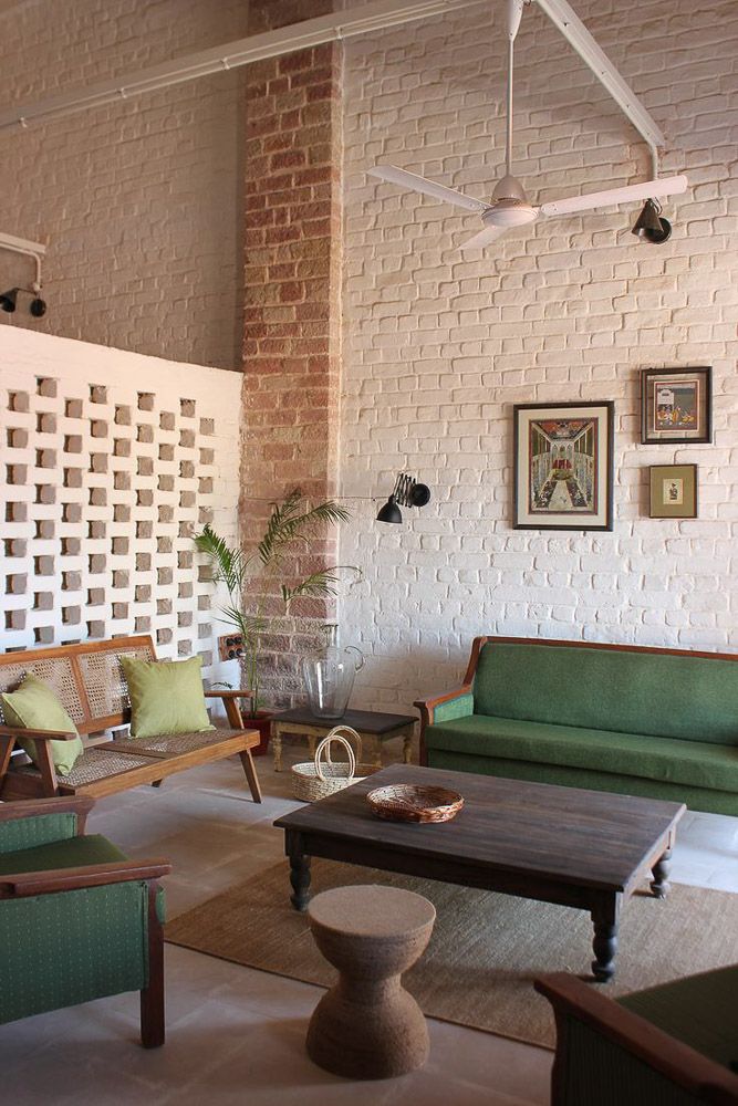 Whitewashed brick wall Indian living room 2026