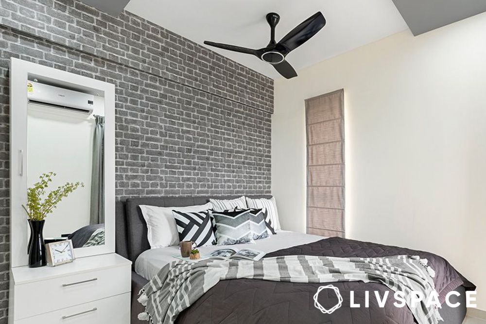 grey exposed brick wall