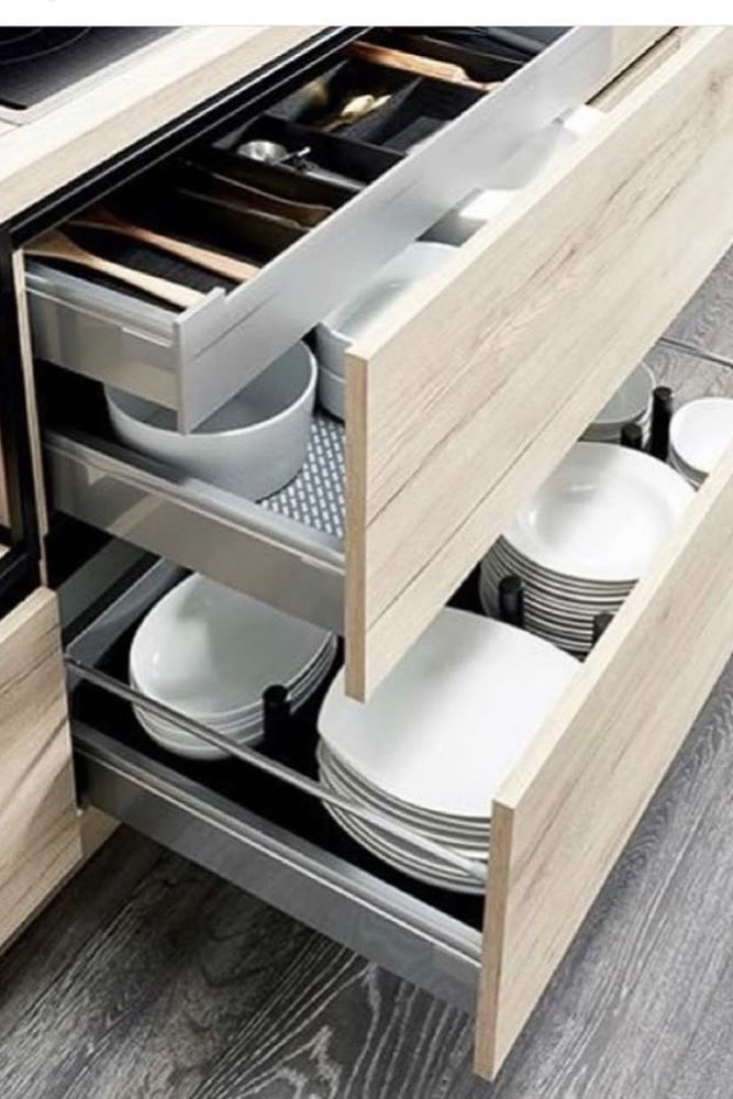 Tandem box drawer with soft close hinges and steel sides in an Indian modular kitchen