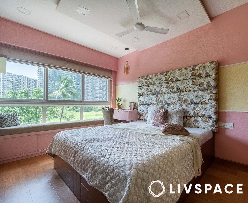 Peripheral POP false ceiling with centre fan in a Mumbai bedroom