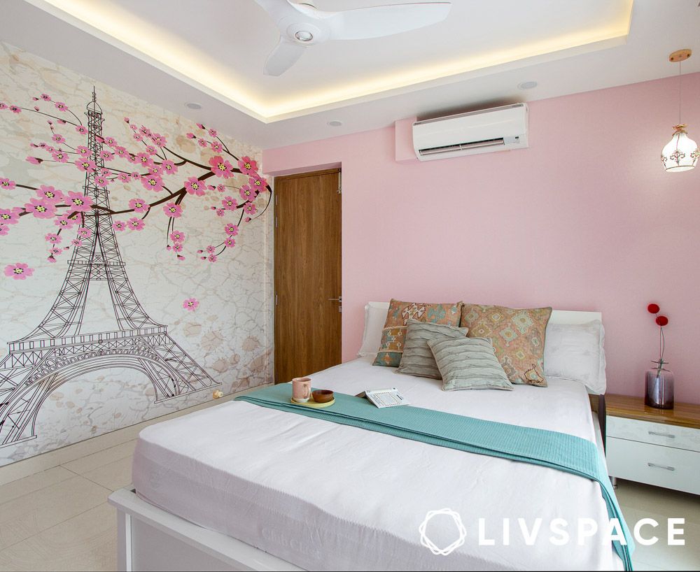 Circular gypsum ceiling with fan in a Hyderabad master bedroom