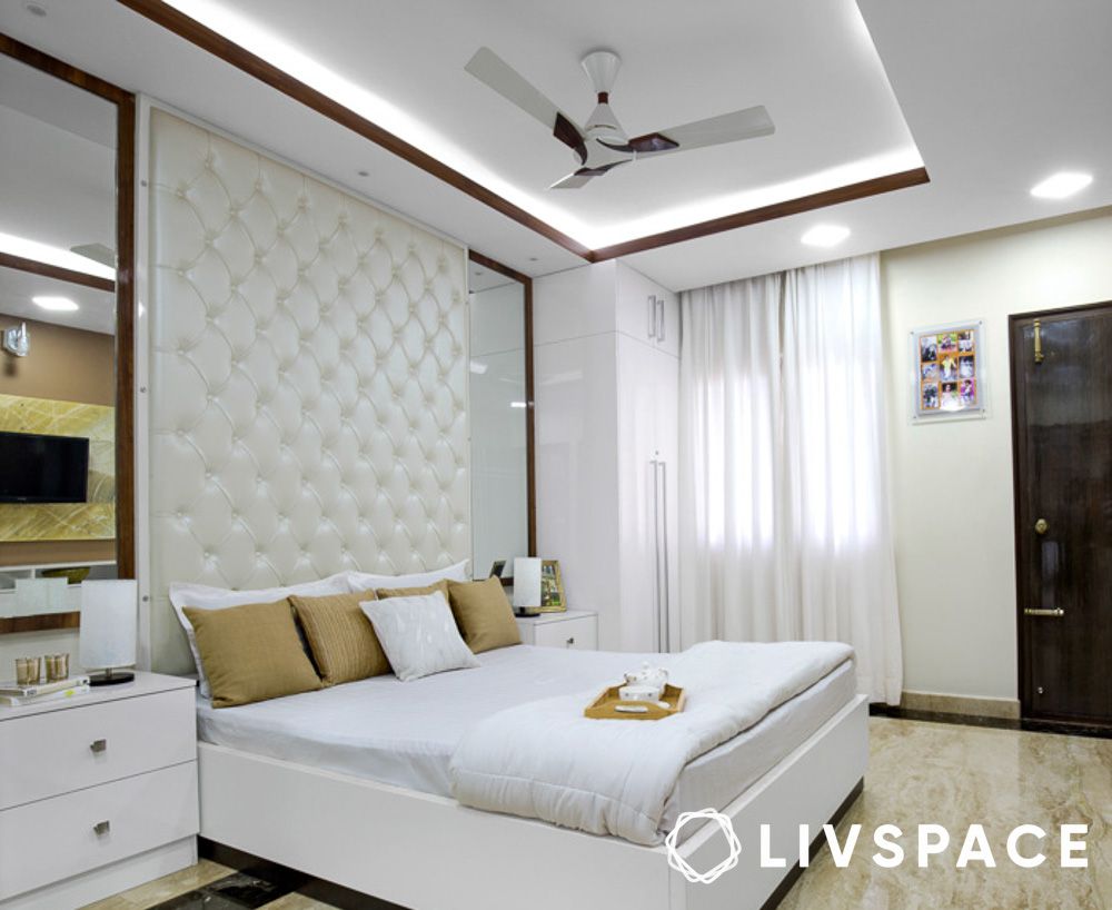 Coffered grid false ceiling design in a Lucknow master bedroom