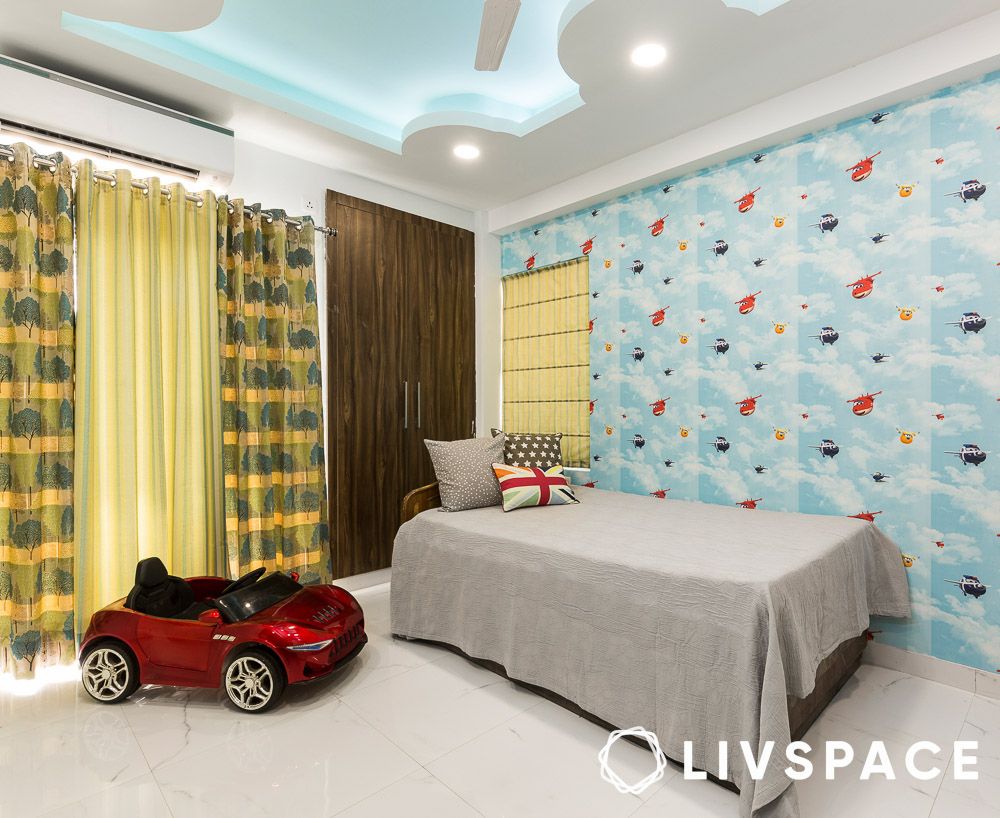 Cloud shaped POP ceiling design for a Nashik kids bedroom