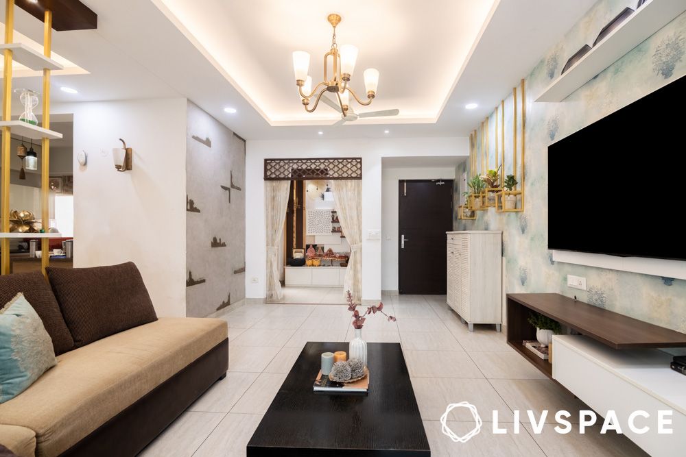 living room with accent wall planters pooja room