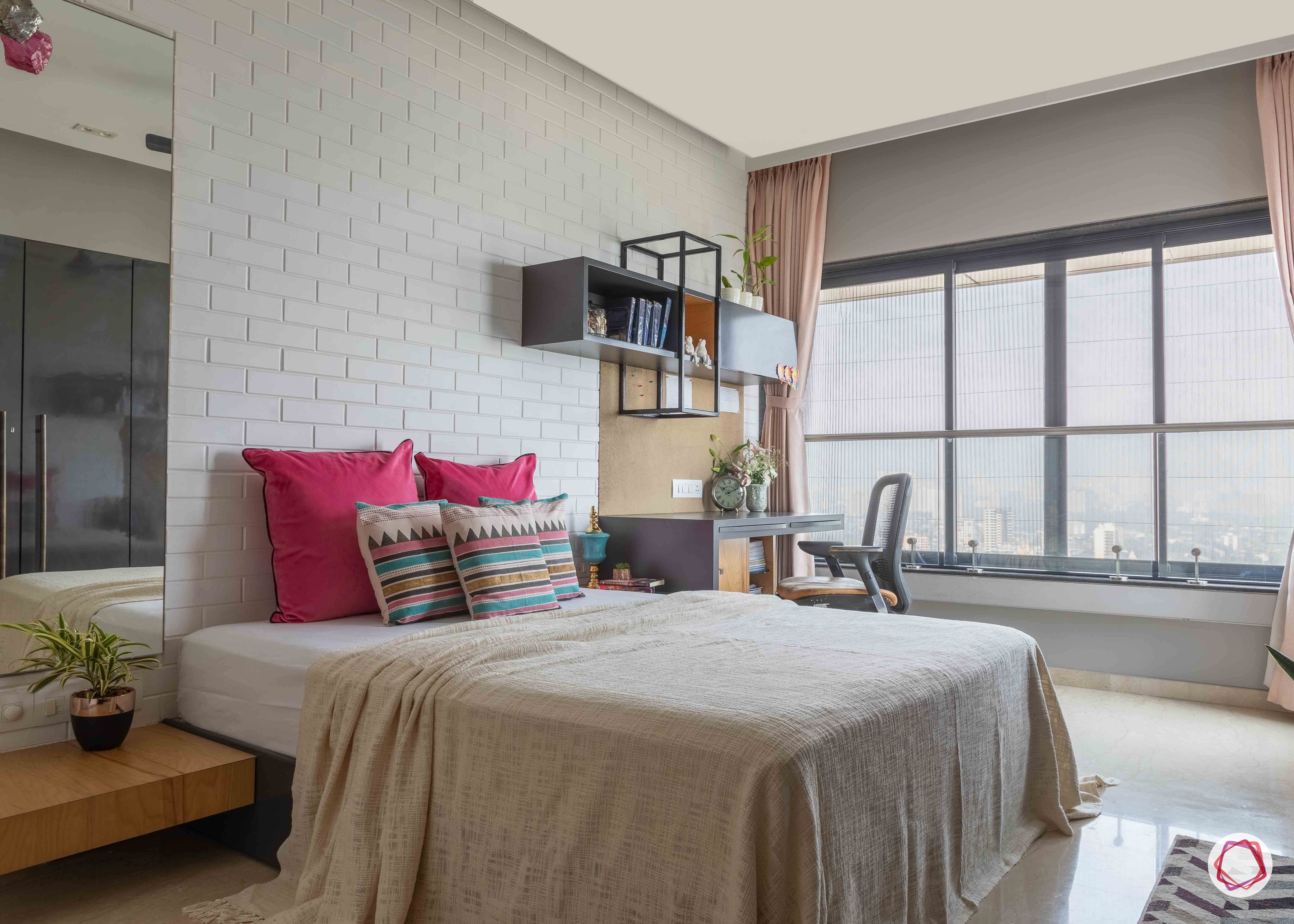  bedroom-interior-design-exposed-brick-wall-pink-pillow-study-table