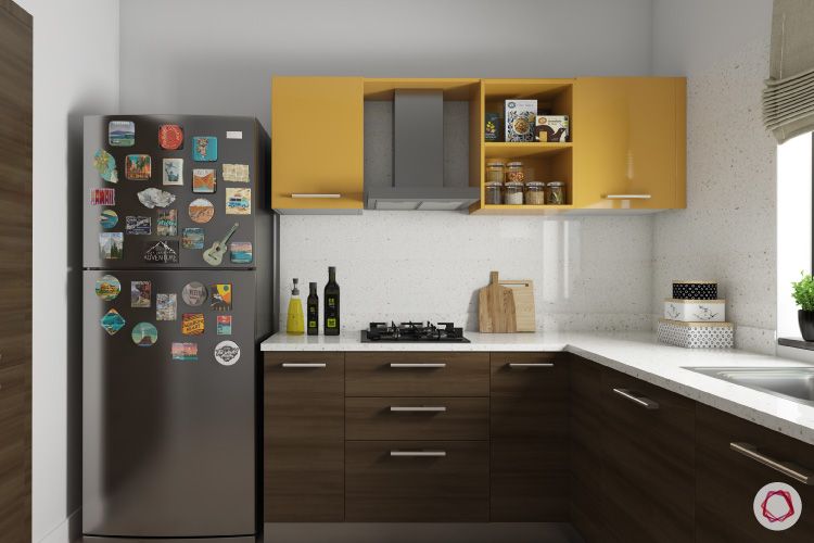 travel-decor-fridge-magnets-yellow-cabinets-white-countertop