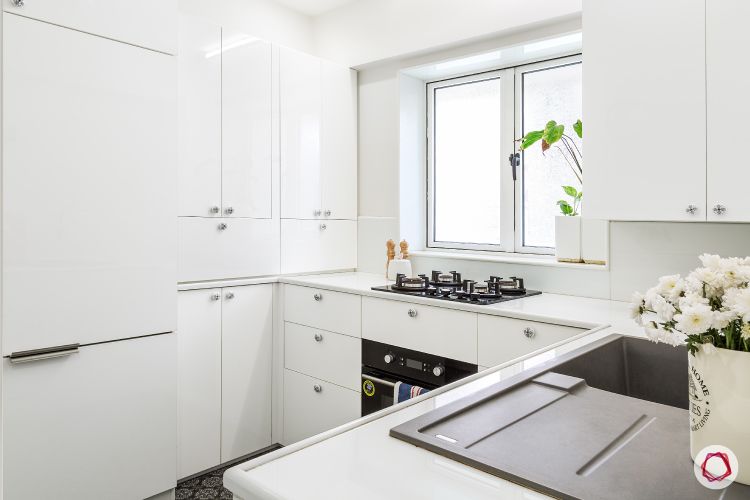 white-upper-lower-cabinets-counter-sink-hob-window