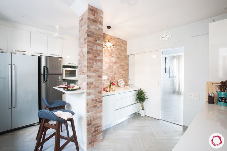 scandinavian interior design-exposed brick wall-tall units-white kitchen