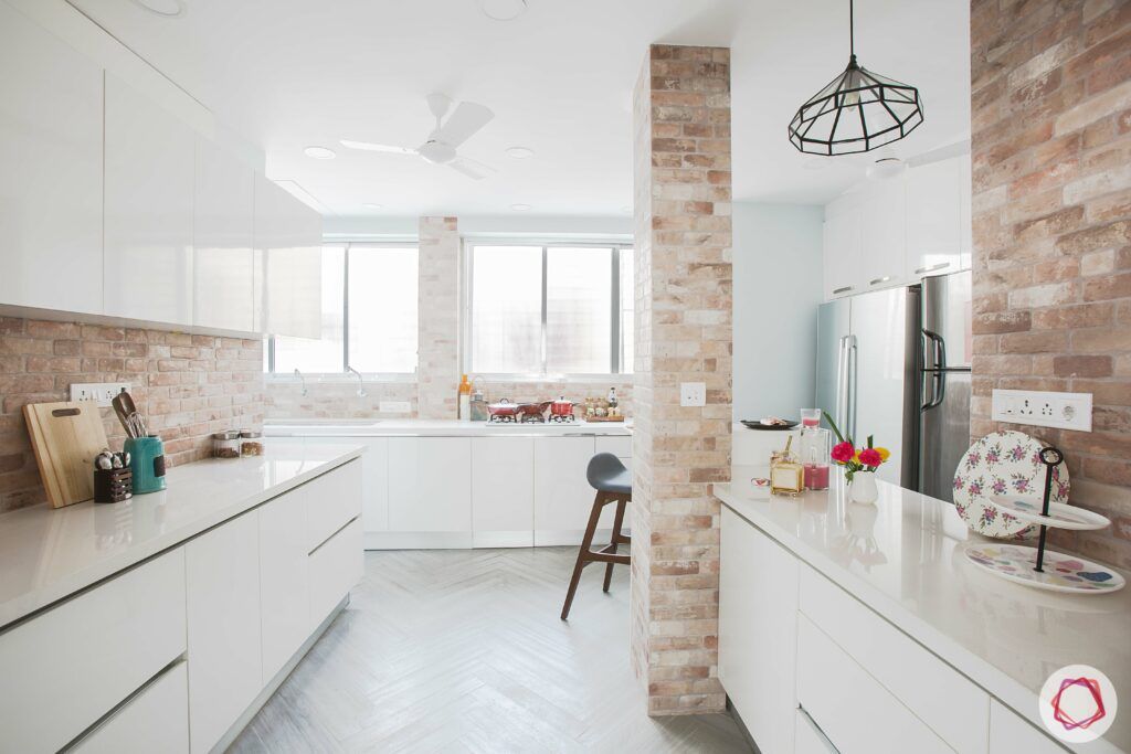scandinavian interior design-white countertop-exposed brick wall