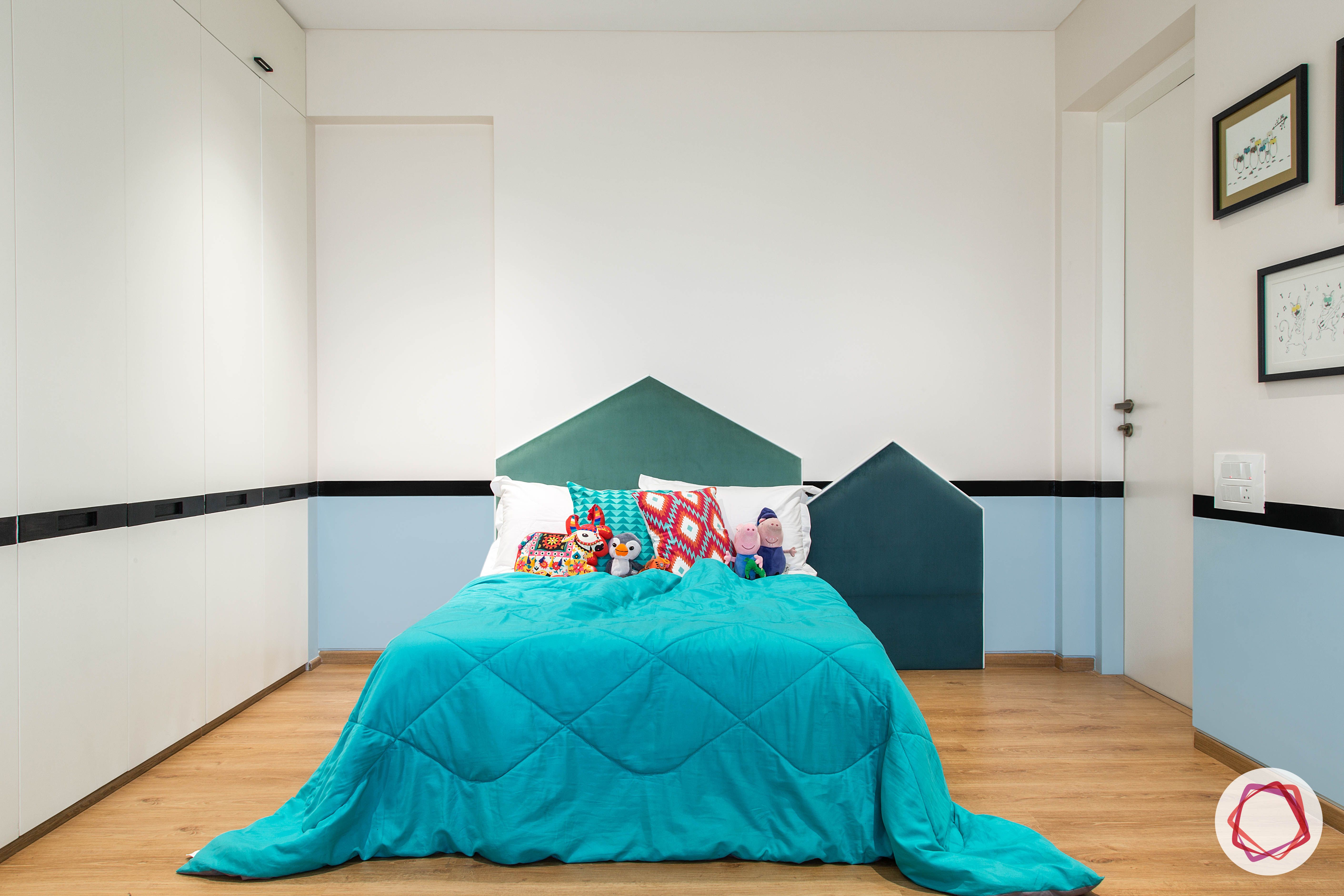 condo-interior design-kids-room-blue-headboard-wooden-flooring