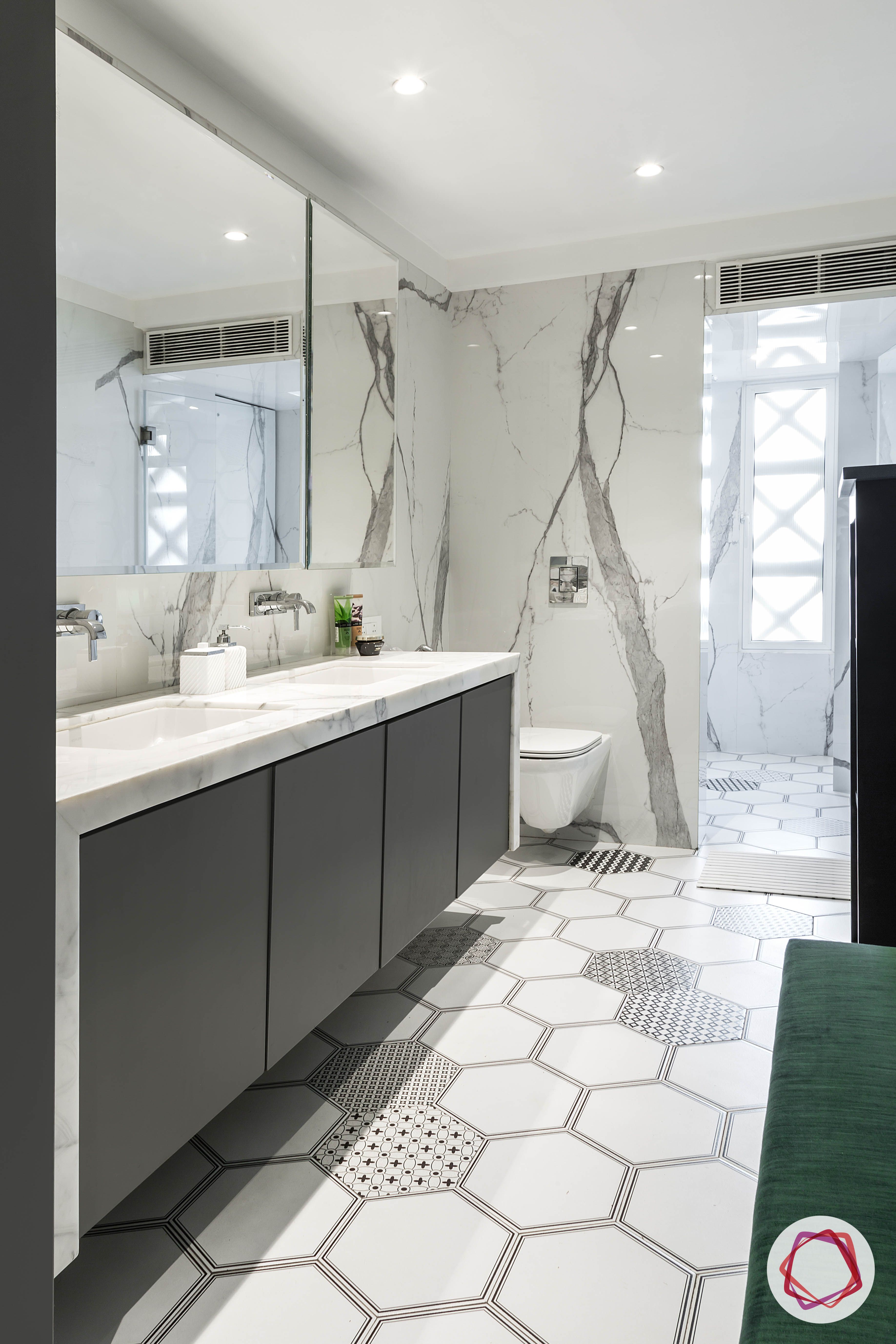 condo-interior-design-hexagonal-tiles-bathroom-grey-mirror