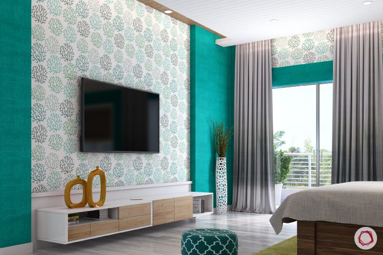 green wallpaper-white vase-tv unit-teal walls