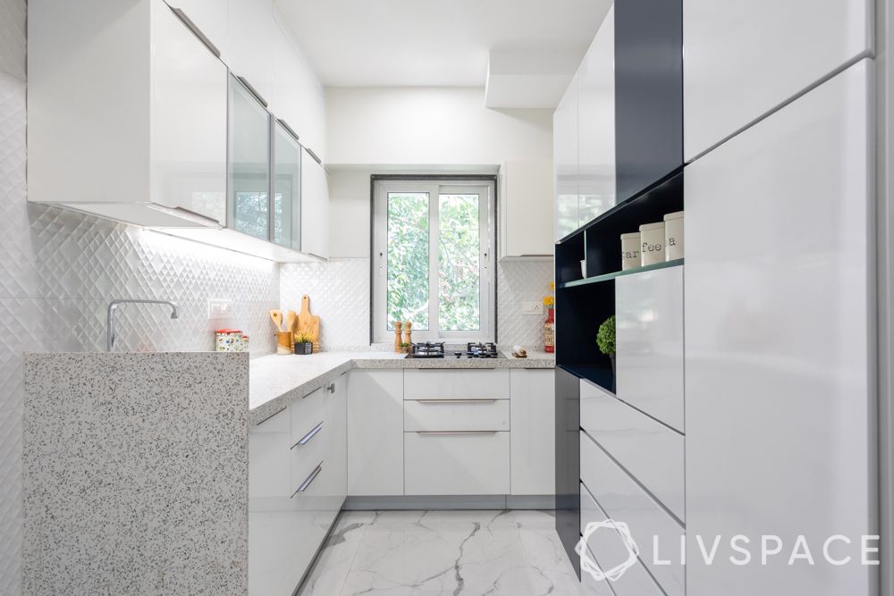 white cabinets-glossy cabinets-brown countertop-modular kitchen