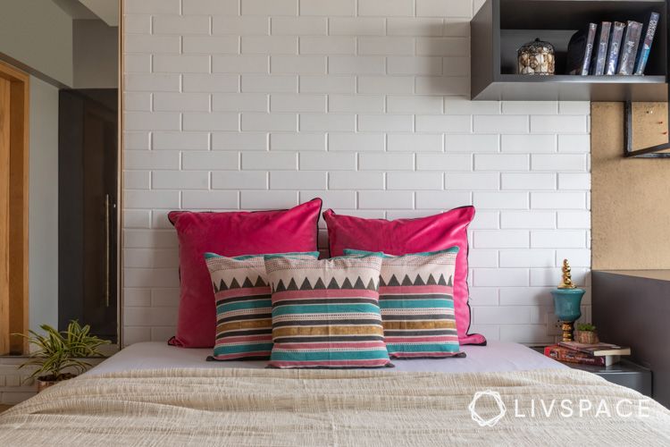 renovation tips-white-brick-wall-tiles-pink-pillow-bedroom