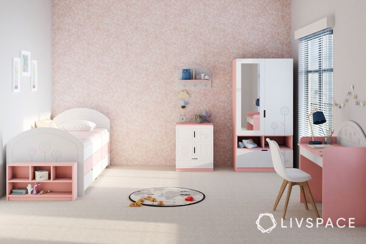 Bedroom-children-play-area-drawers-study-table-pink-wallpaper