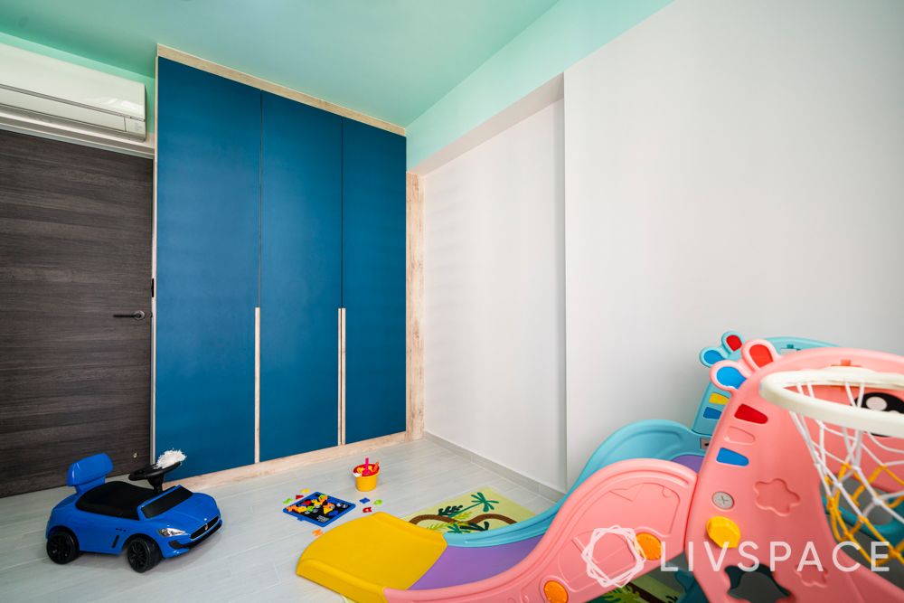 Kids room-blue laminate cupboard-slide-blue ceiling