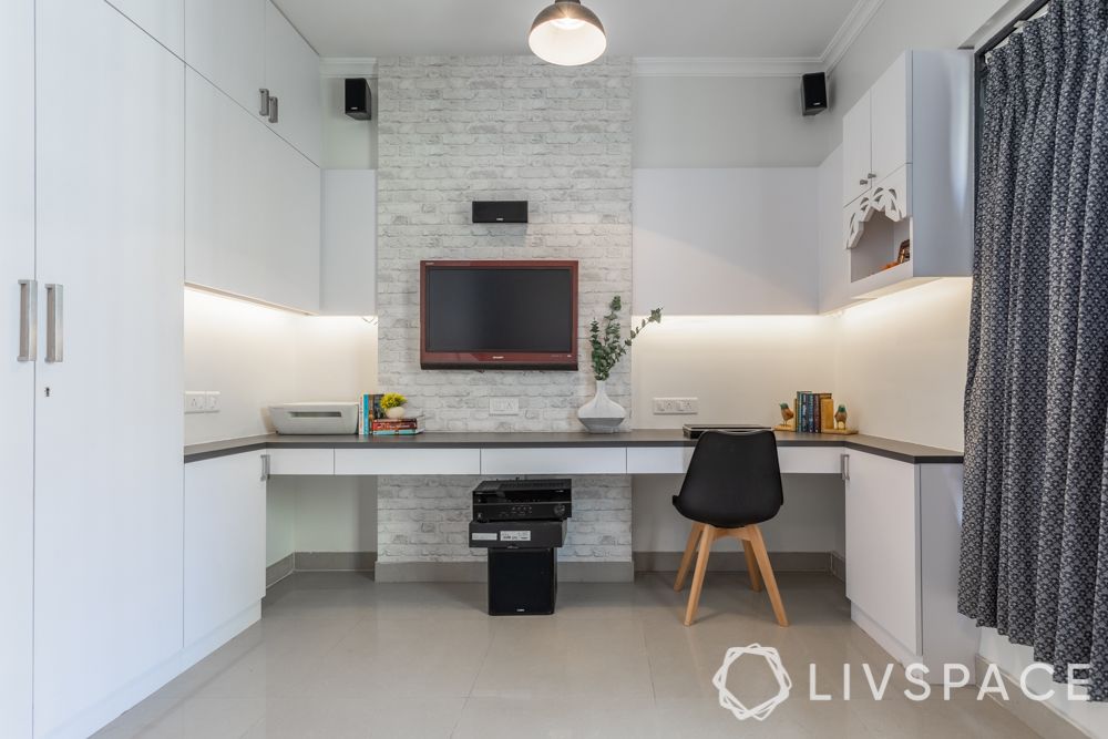 tv unit-study unit-brick wall design-pendant lights-entertainment-room